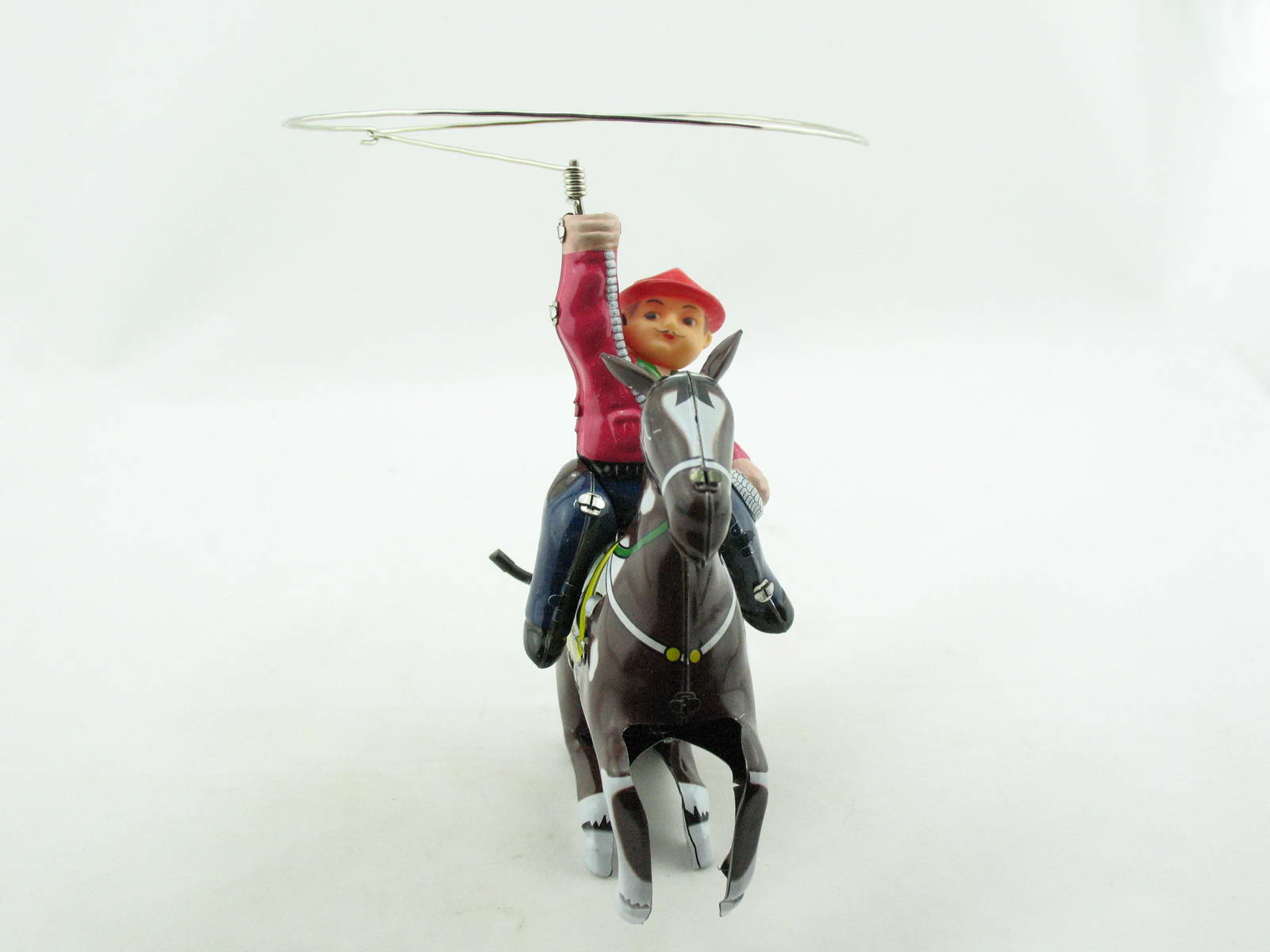 Blechspielzeug - Cowboy auf Pferd mit Lasso