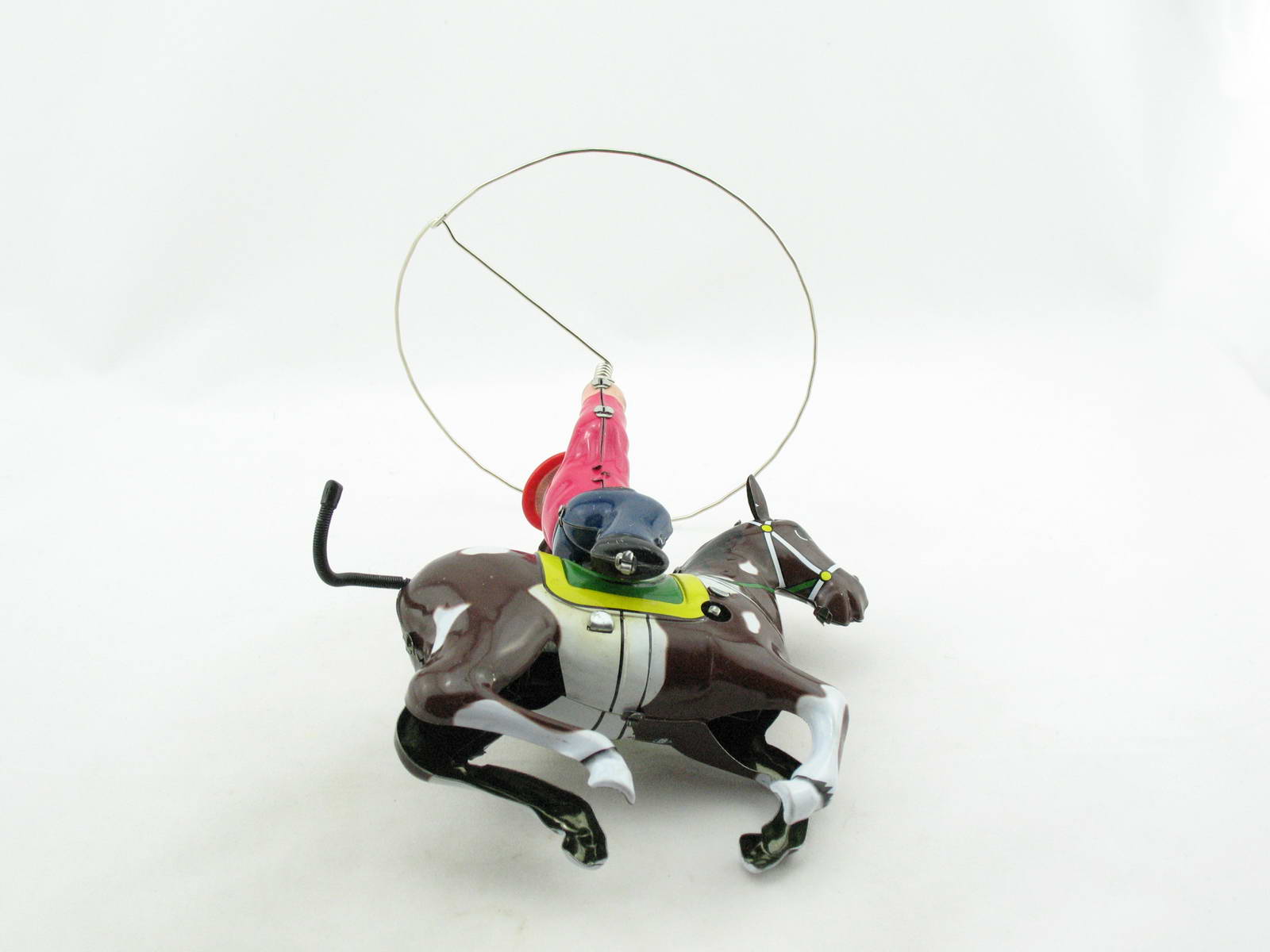 Blechspielzeug - Cowboy auf Pferd mit Lasso